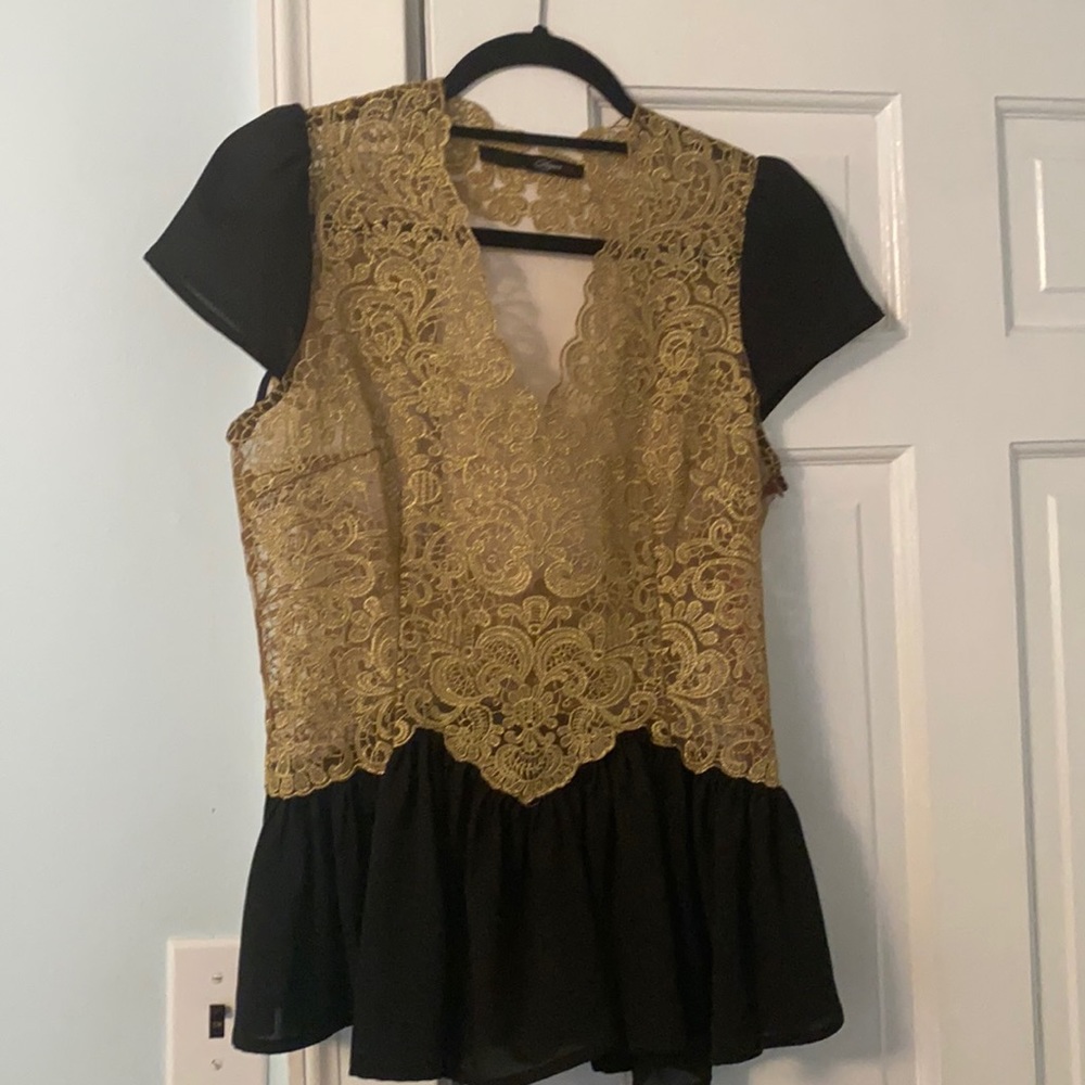 Stylish and unique gold and black top